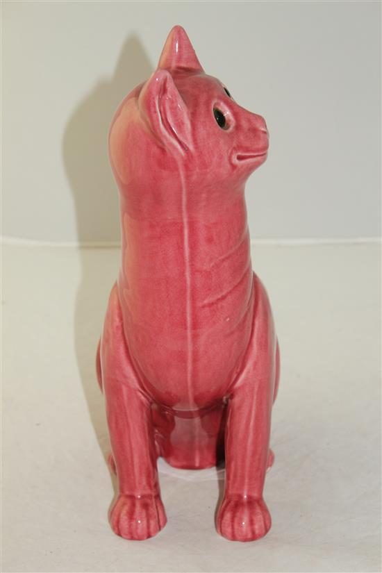 After Louis Wain. A Weymss pink glazed model of a seated cat, 32.5cm